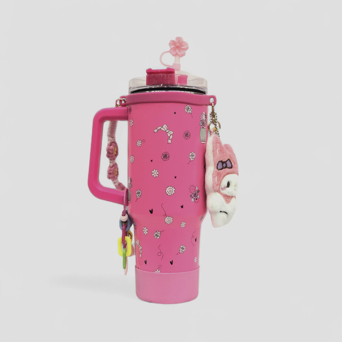 Pink character tumbler with handle, flip lid, keychain charms and plush pouch