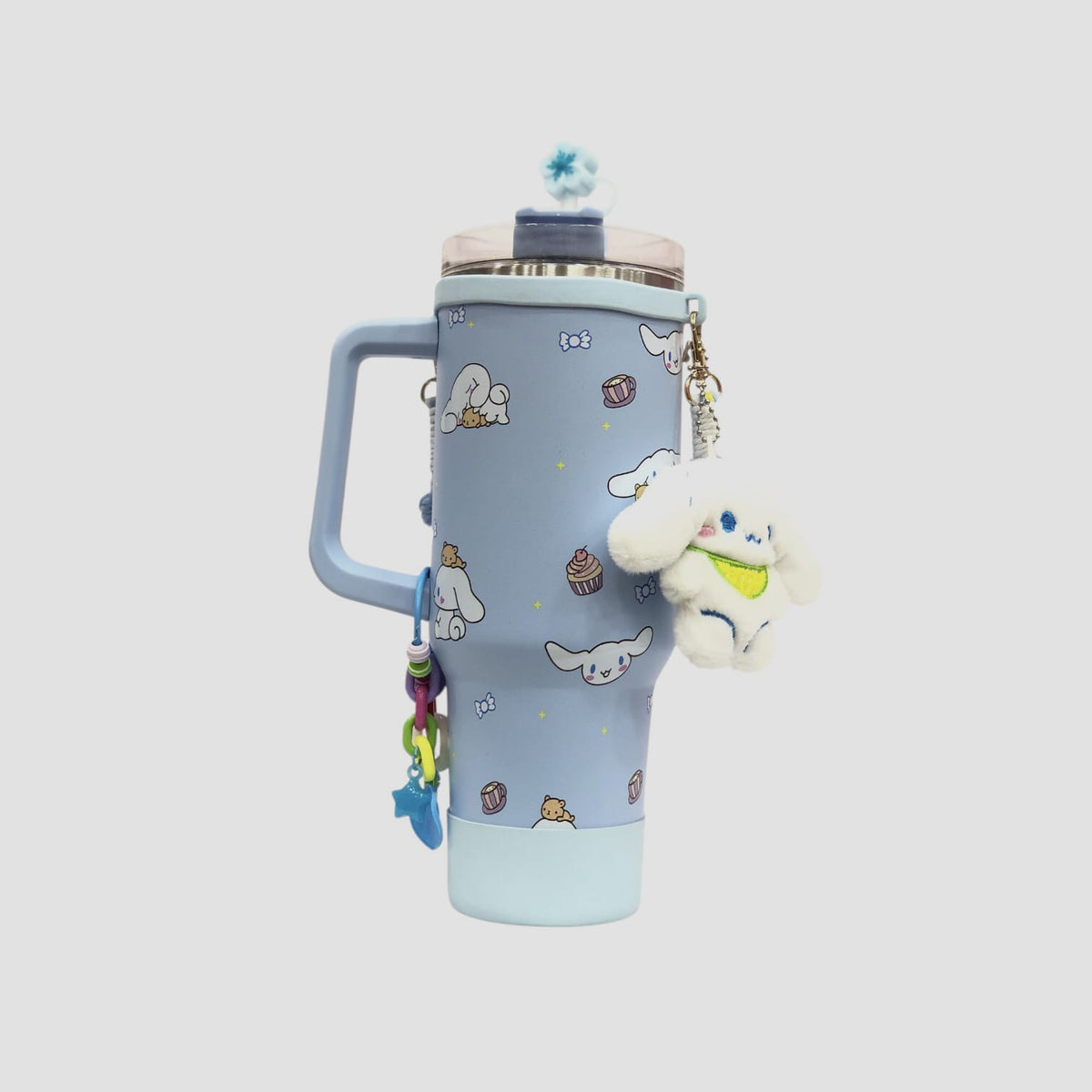 Light blue character tumbler with handle, straw lid, and hanging plush charm
