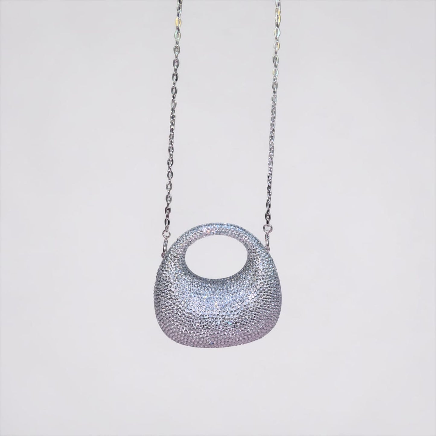 RADIANCE CRYSTAL RING HAND CLUTCH