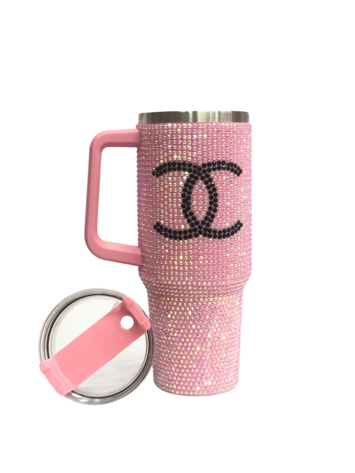 Pink rhinestone tumbler with pink handle, clear lid, and black CC-style logo