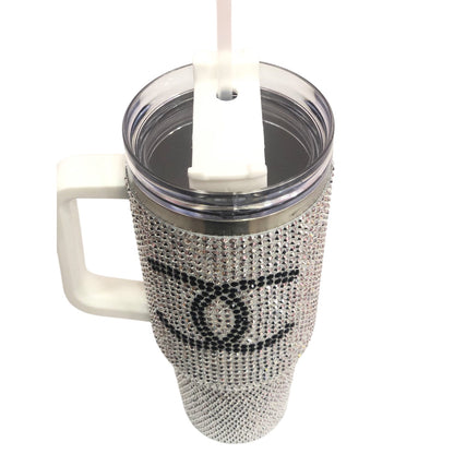 Silver rhinestone tumbler with clear lid and straw, open lid view with black CC-style logo