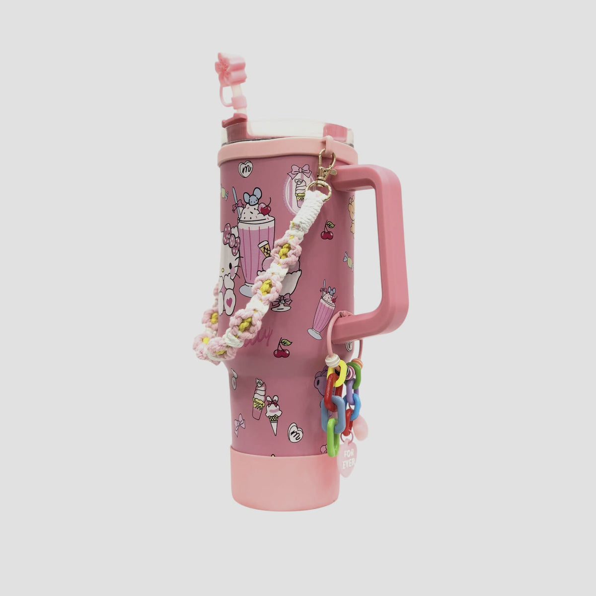 Pink Hello Kitty character tumbler with handle, flip lid, charm strap and plush