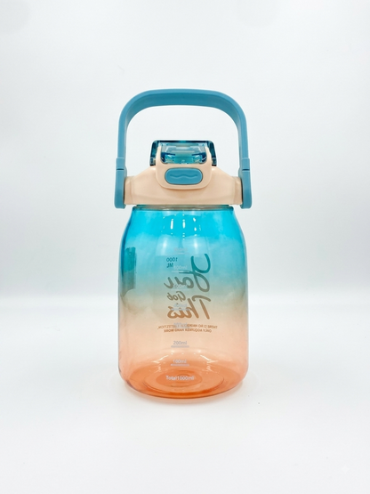 1L gradient water bottle in teal and coral with flip lid and "You Got This" print.