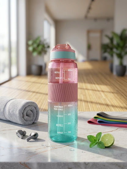 Sports water bottle with straw, pink and teal gradient bottle with flip straw lid.