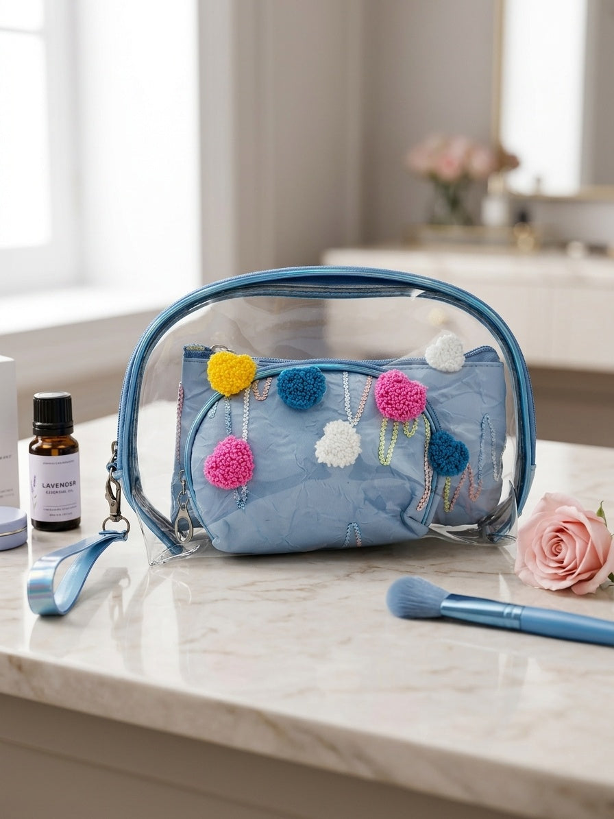 Light blue clear cosmetic pouch set with fuzzy heart appliques, open view, and zipper