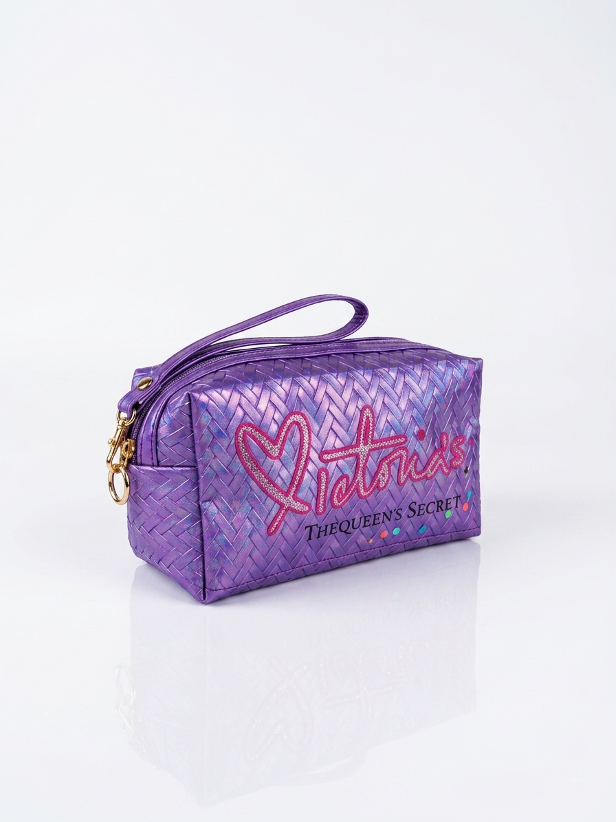Iridescent woven makeup pouch in purple with wrist strap, zip closure, gold charm