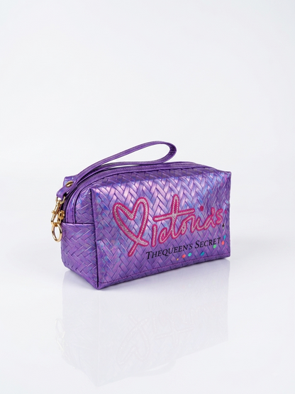 Iridescent woven makeup pouch in purple with wrist strap, zip closure, gold charm
