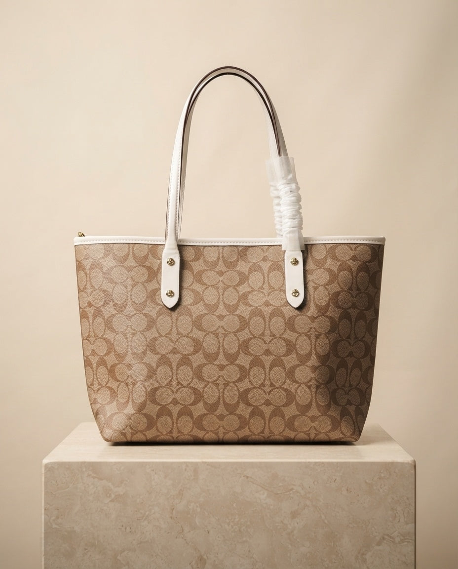 Tan and cream monogram structured tote bag with white handles