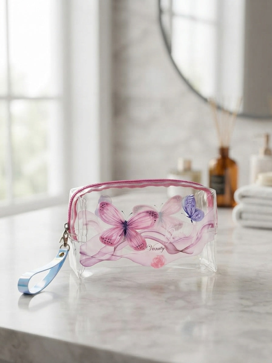 Transparent cosmetic bag with pink floral-and-butterfly print, top zipper and wrist strap