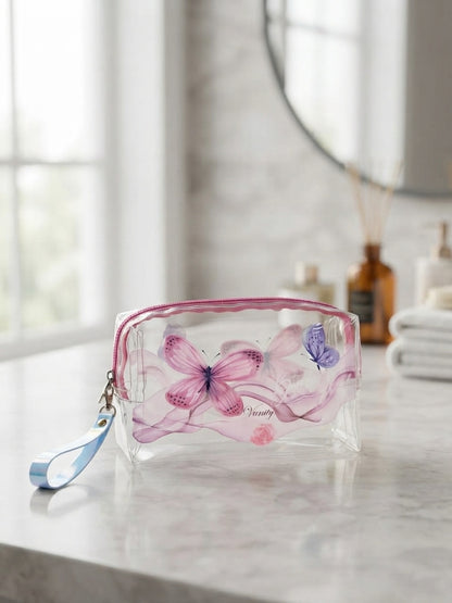Transparent cosmetic bag with pink floral-and-butterfly print, top zipper and wrist strap