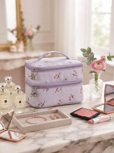 Purple floral quilted double-layer cosmetic organizer bag with top handle and zip closure.