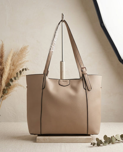 Cream structured tote bag with top handles and zip-top opening frame