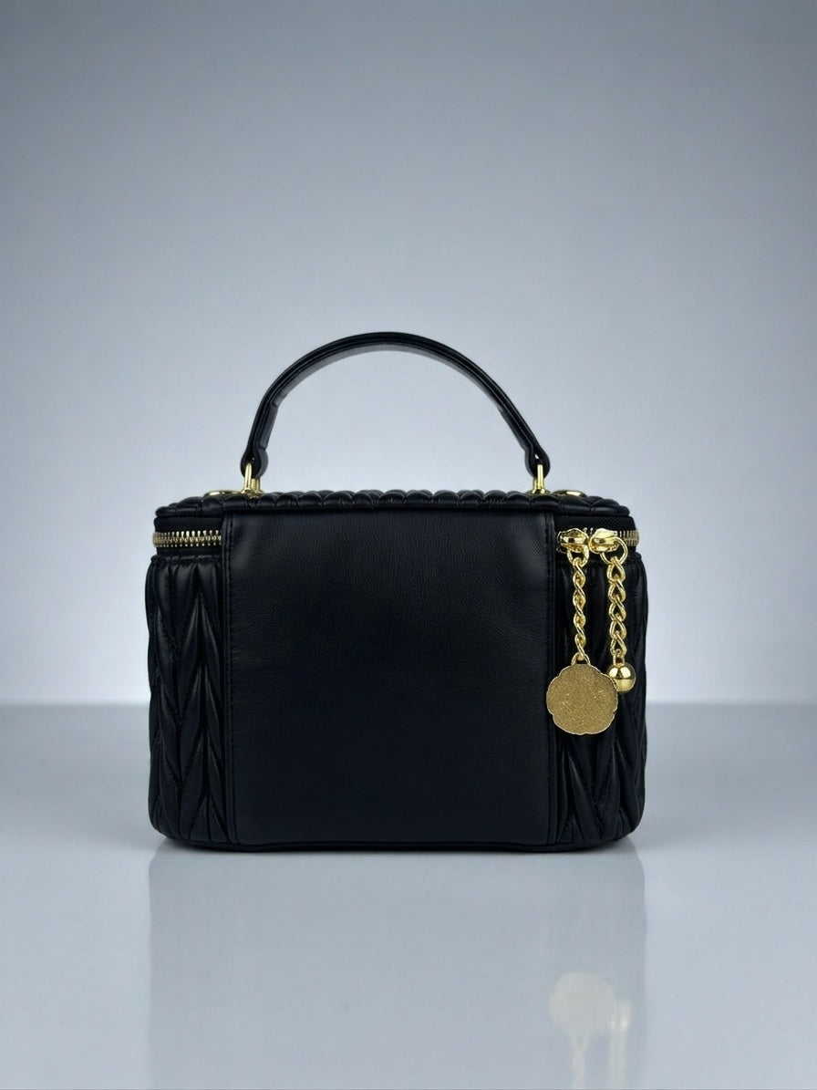 Miu Miu black matelassé leather vanity cosmetic case with top handle and gold zipper