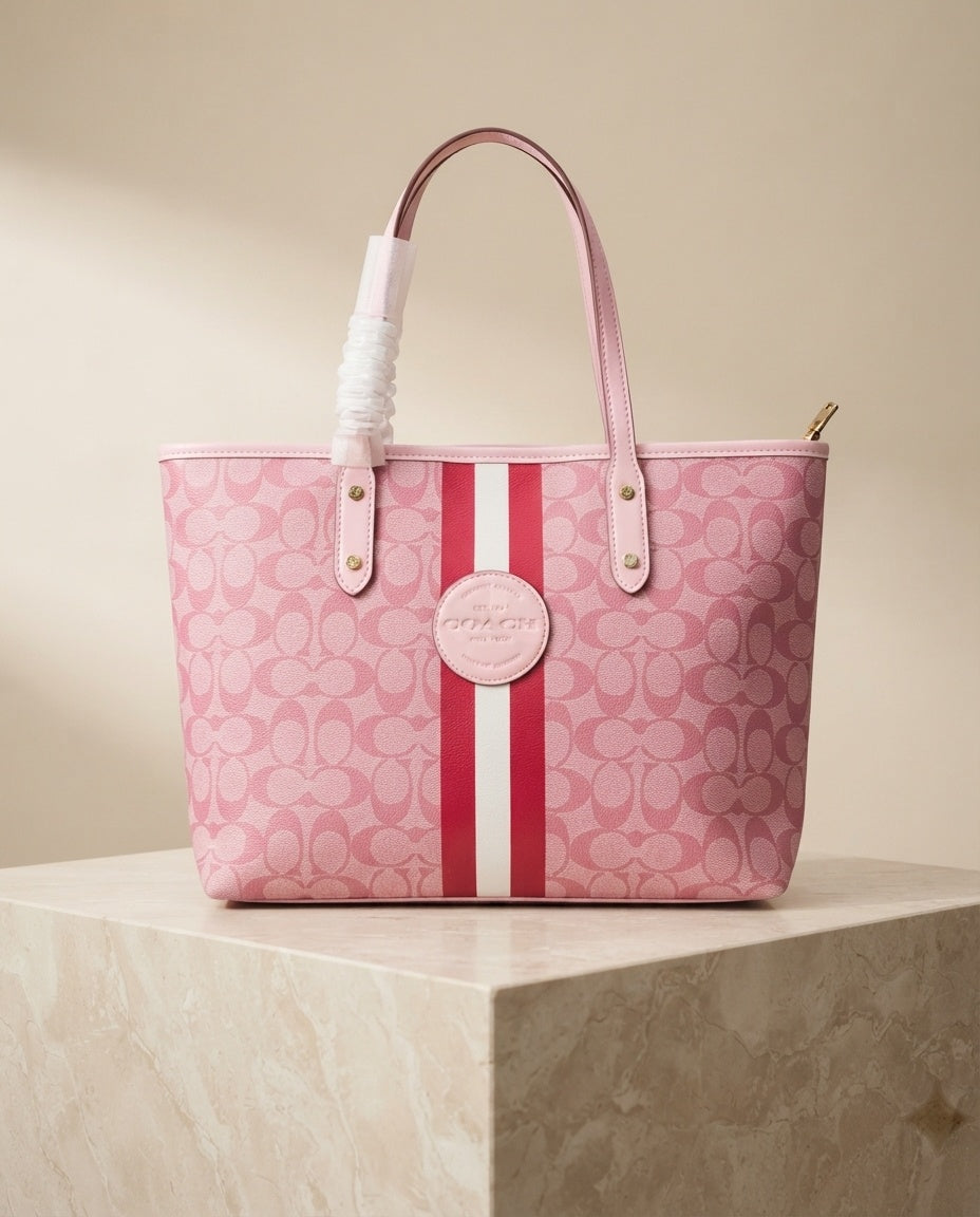 Pink monogram structured tote bag with center circle logo and red/white stripe