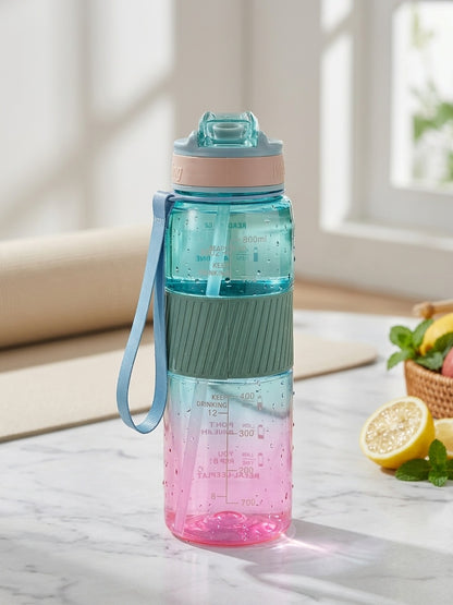 Sports water bottle with straw, teal-to-pink gradient bottle with long carry strap.