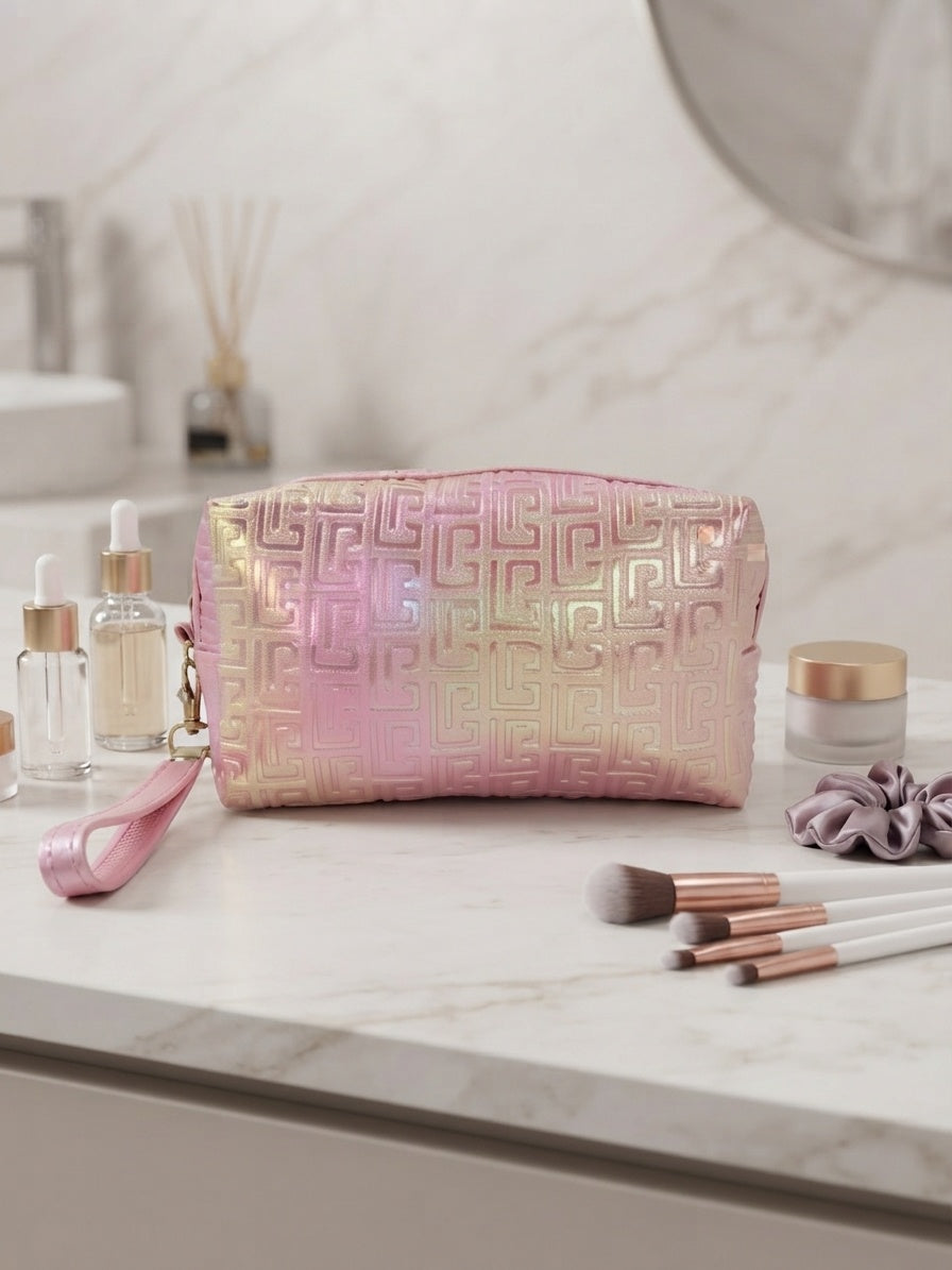 Iridescent geometric embossed cosmetic pouch with wristlet strap, blush pink