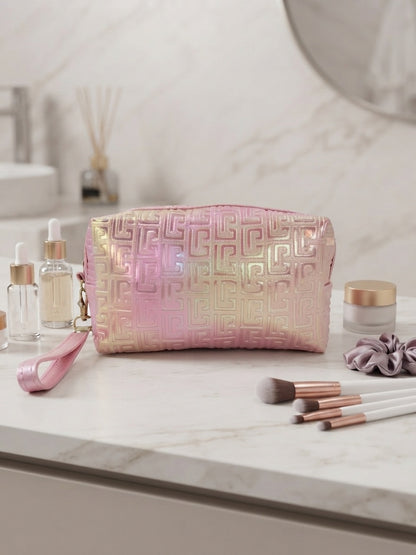 Iridescent geometric embossed cosmetic pouch with wristlet strap, blush pink
