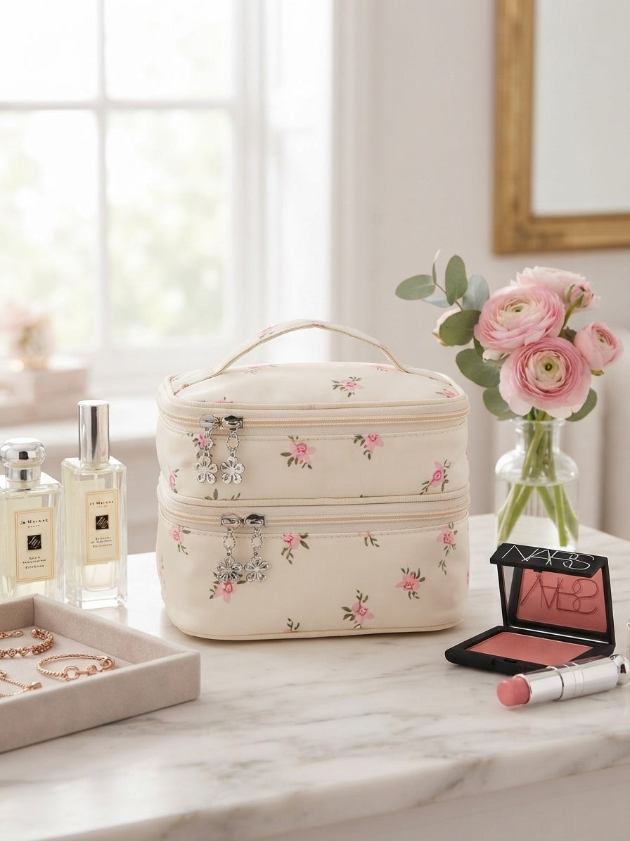 Cream floral quilted double-layer cosmetic organizer bag with top handle and zip closure.
