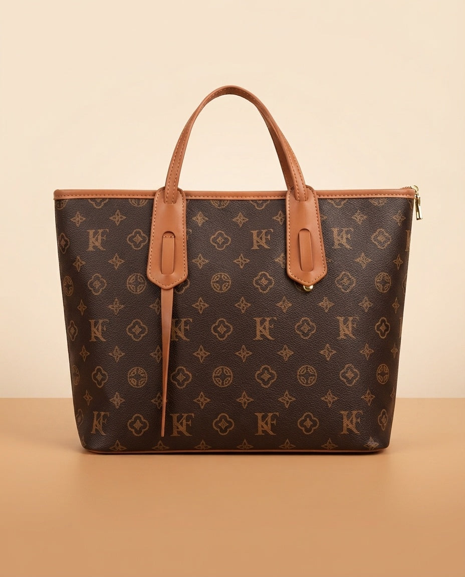 Monogram patterned structured tote bag with tan top handles and front pocket