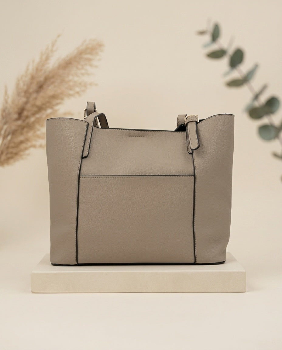 Beige structured tote bag with top handles and front panel detail