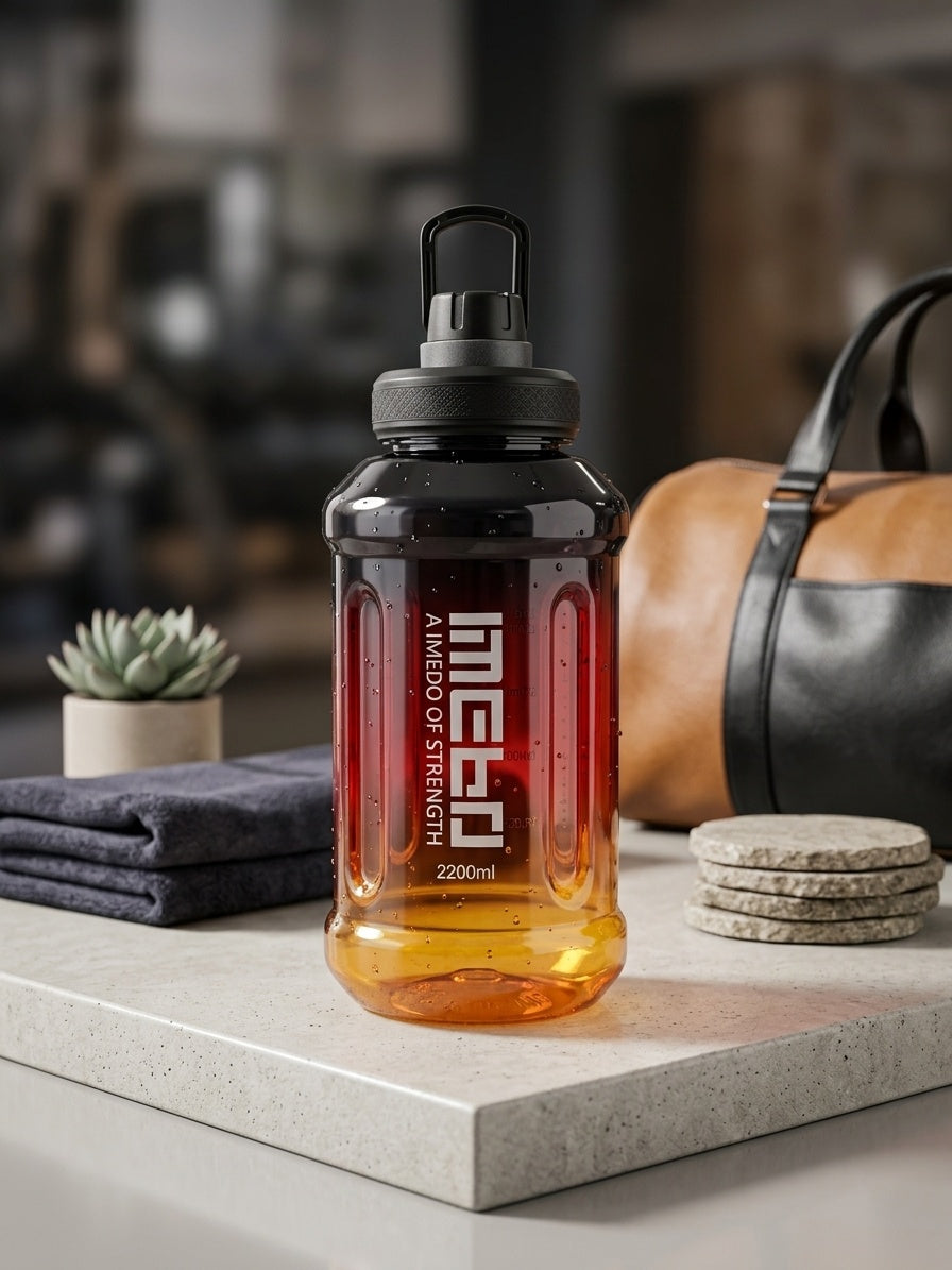 Sports water bottle with black cap and red-to-amber ombre