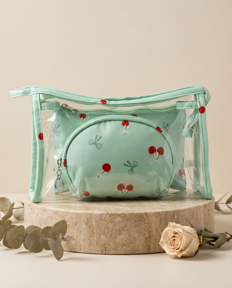 Mint green cherry-print cosmetic pouch set with zippered pouches and clear outer bag
