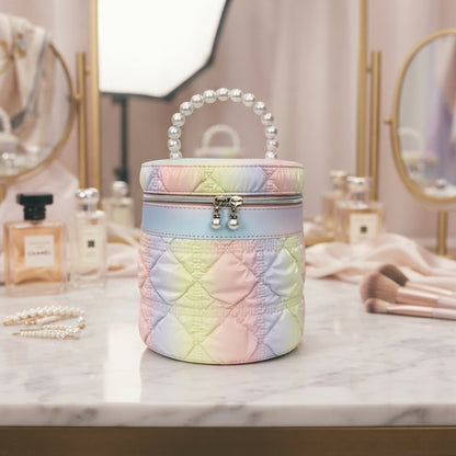 Iridescent pastel quilted cylinder vanity bag with pearl bead handle and top clasp