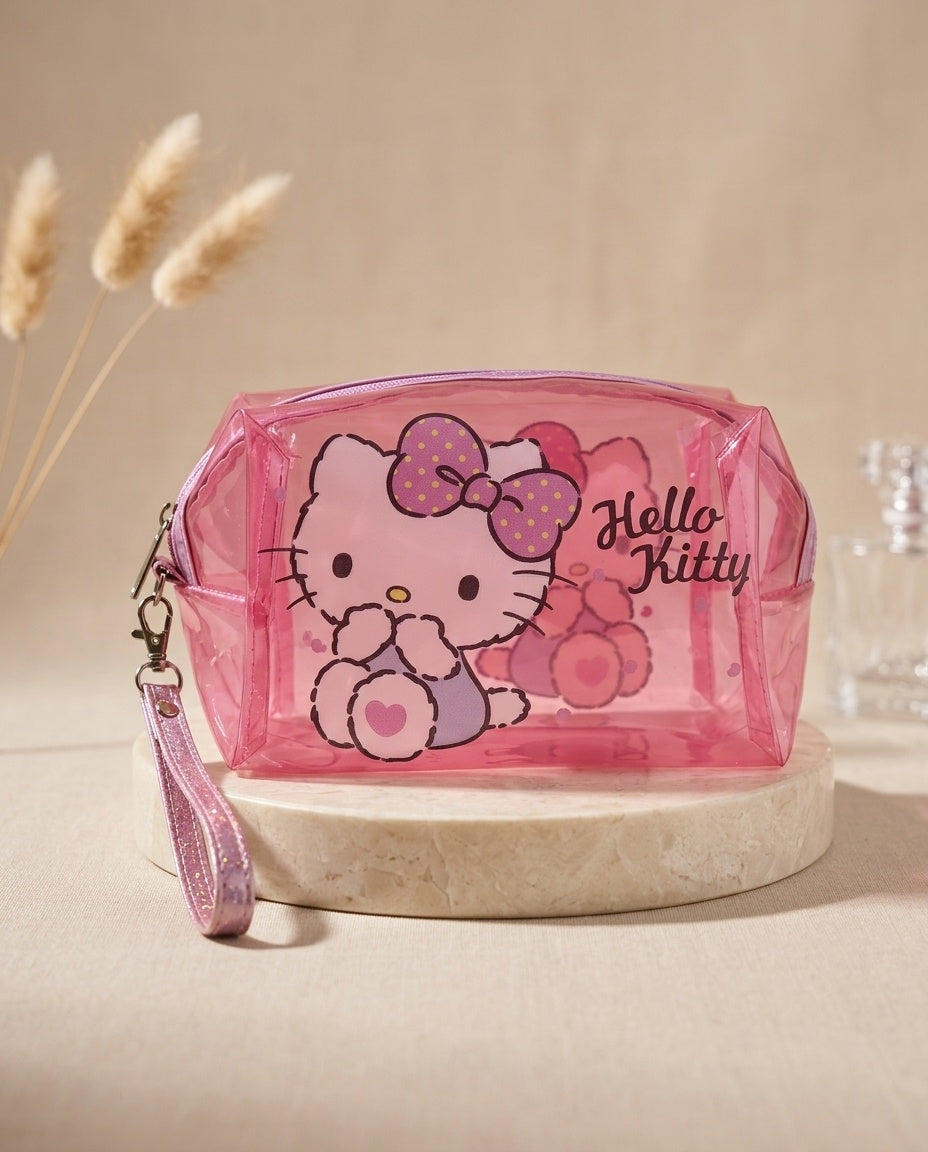 Pink translucent cosmetic pouch with Hello Kitty graphic and wristlet strap