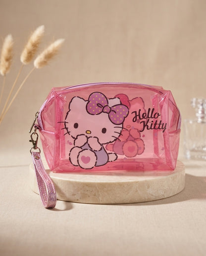 Pink translucent cosmetic pouch with Hello Kitty graphic and wristlet strap