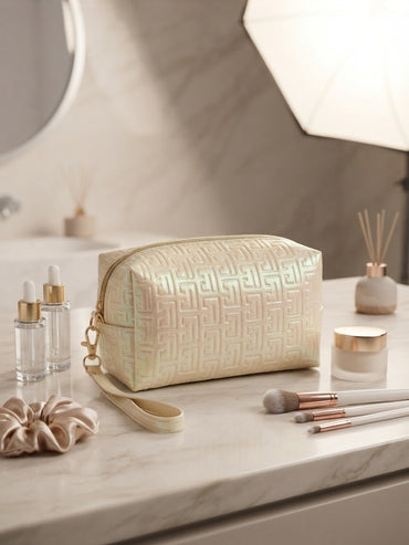 Iridescent geometric embossed cosmetic pouch with wristlet strap, gold-beige