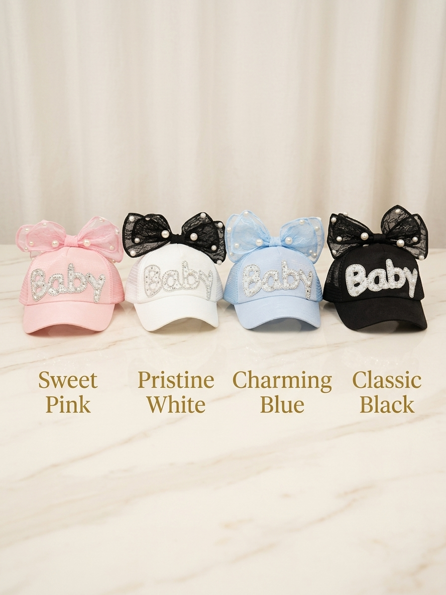 Four kids trucker caps: pink, white, blue, and black, each with 'Baby' bow details