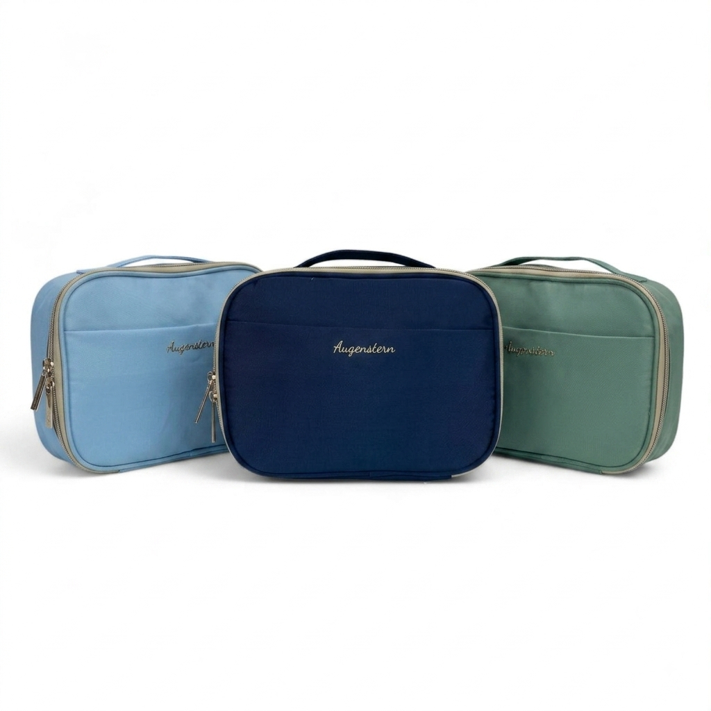Set of three zippered toiletry bags: light blue, navy, and green, each with handle