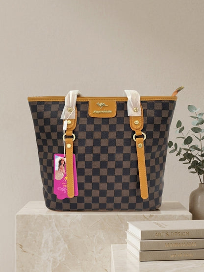 Dark checkerboard tote bag with tan handles and white top ties, with pink charm tag