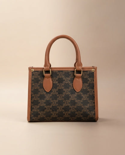 Brown patterned structured tote bag with tan handles and top front leather tabs
