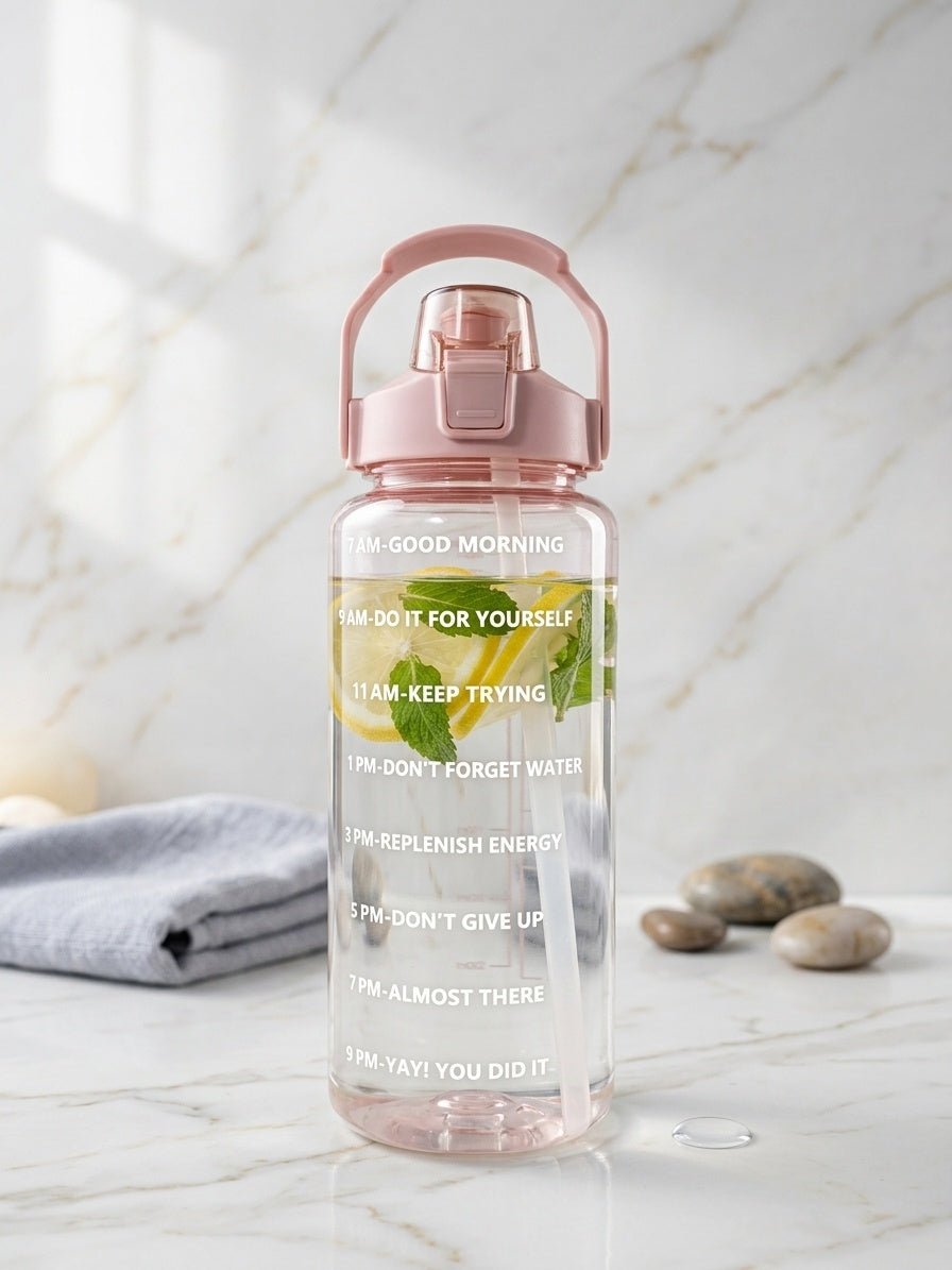 Pink motivational time-marker water bottle with carry handle and flip-top lid