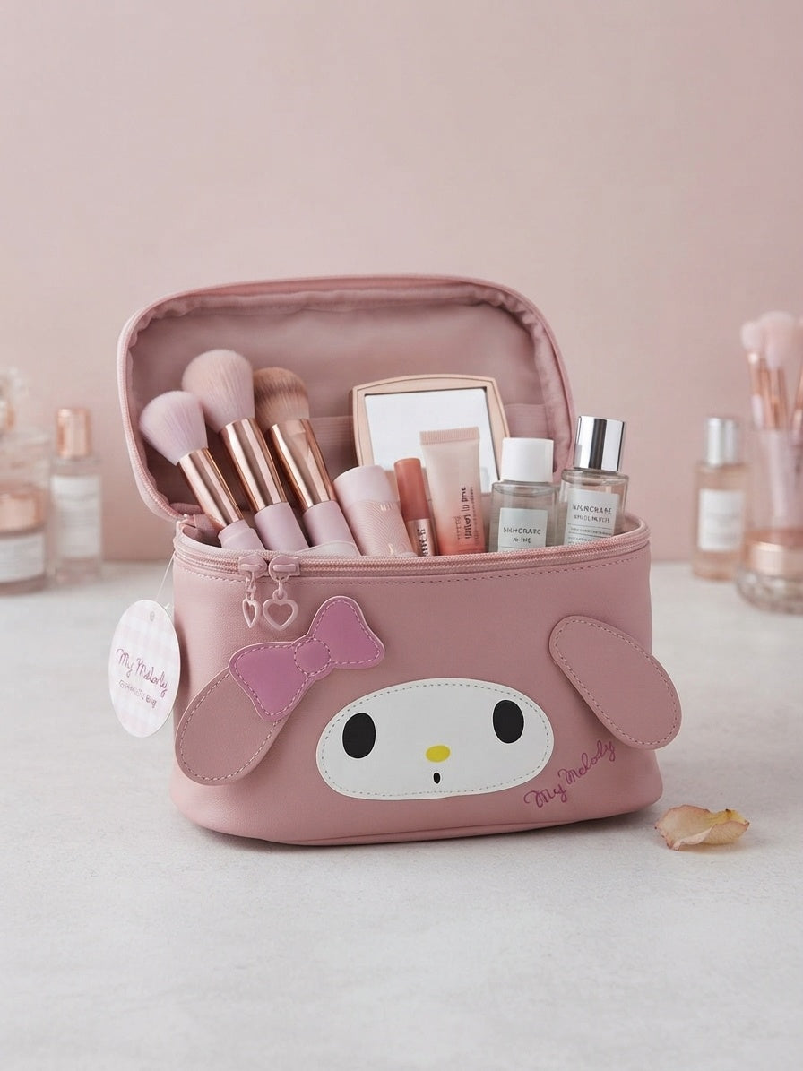 Pink character cosmetic bag with 3D ears and bow, front view open to show tools