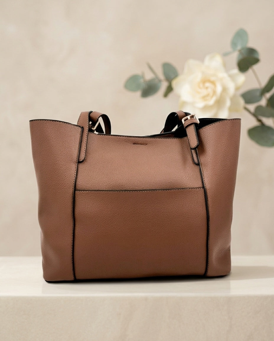 Tan structured tote bag with top handles and front center panel seam