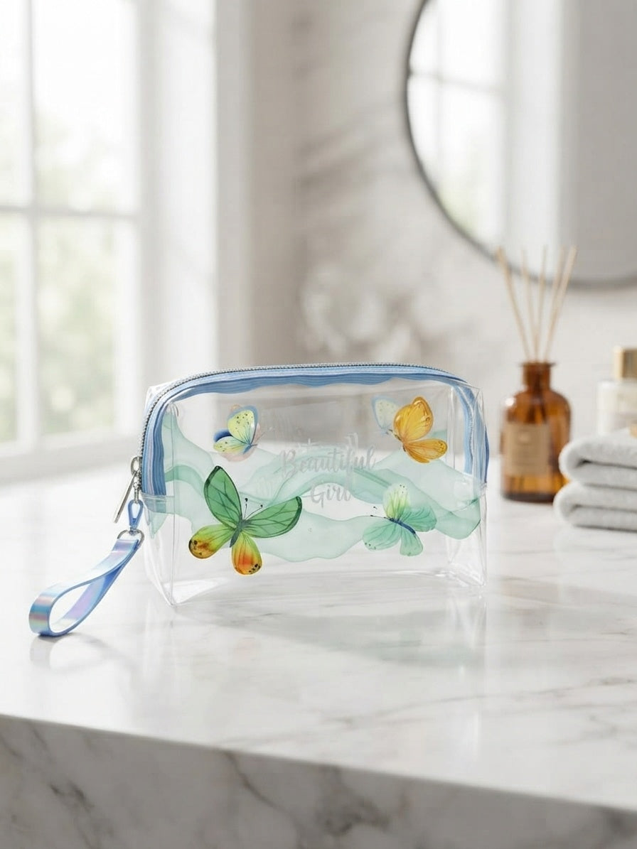 Transparent cosmetic bag with green and yellow butterflies and flowers, top zipper and wrist strap