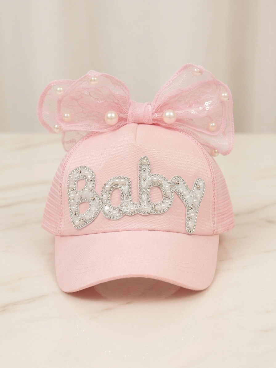 Kids pink trucker cap with rhinestone 'Baby' and sheer bow with pearl accents