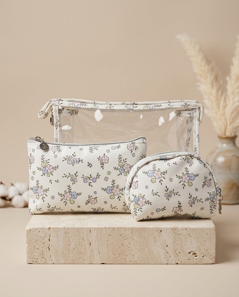 Two-piece floral clear cosmetic pouch set with zip pouches and matching round pouch