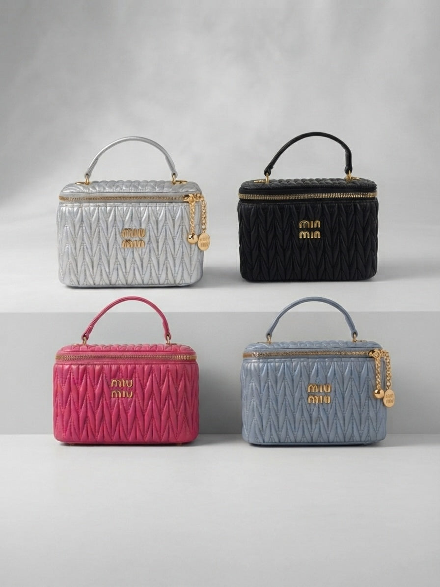 miu miu Matelassé leather vanity case set in silver, black, pink, and blue