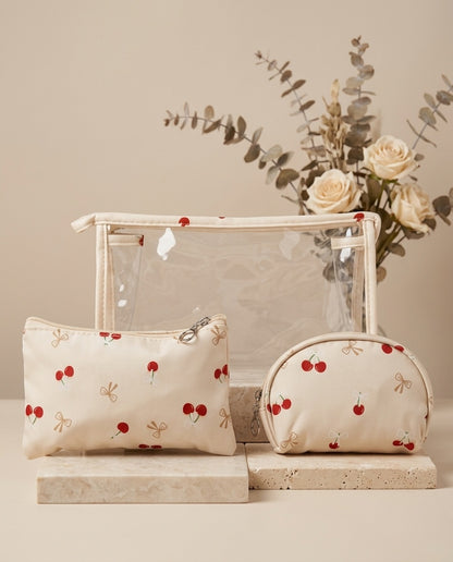 Cream cherry-print cosmetic pouch set with zippered rectangular pouch and round mini pouch