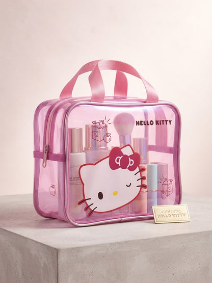 Transparent pink cosmetic travel bag with Hello Kitty graphic and top handles