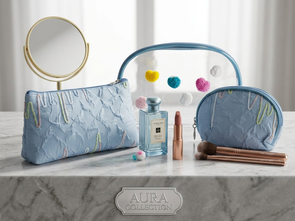 Blue nested clear cosmetic pouches with fuzzy heart appliques and gold-toned zipper