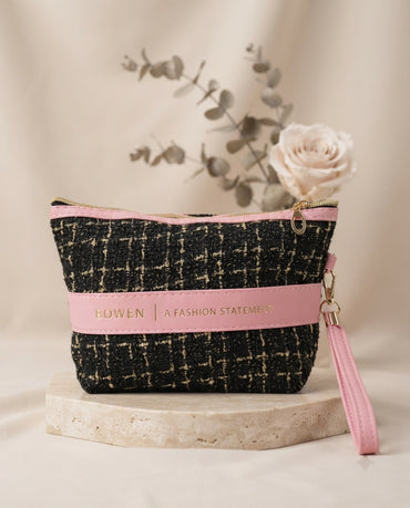 Black tweed cosmetic pouch with pink leatherette band, ring wristlet strap, zipper top