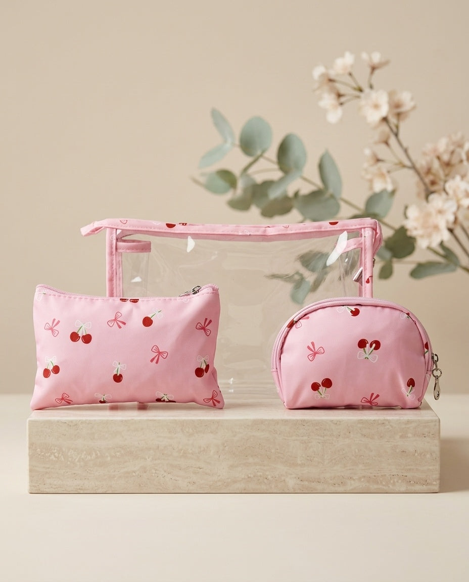 Pink cherry-print cosmetic pouch set with clear organizer bag, rectangular pouch, and mini pouch