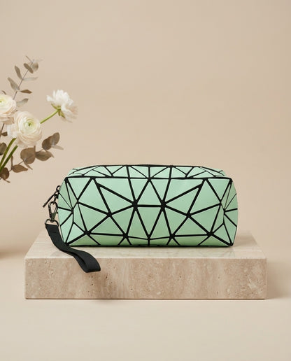 Light green geometric cosmetic pouch with wristlet strap and zipper