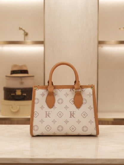 Structured monogram tote bag with flower charm, top handles, tan trim, white canvas
