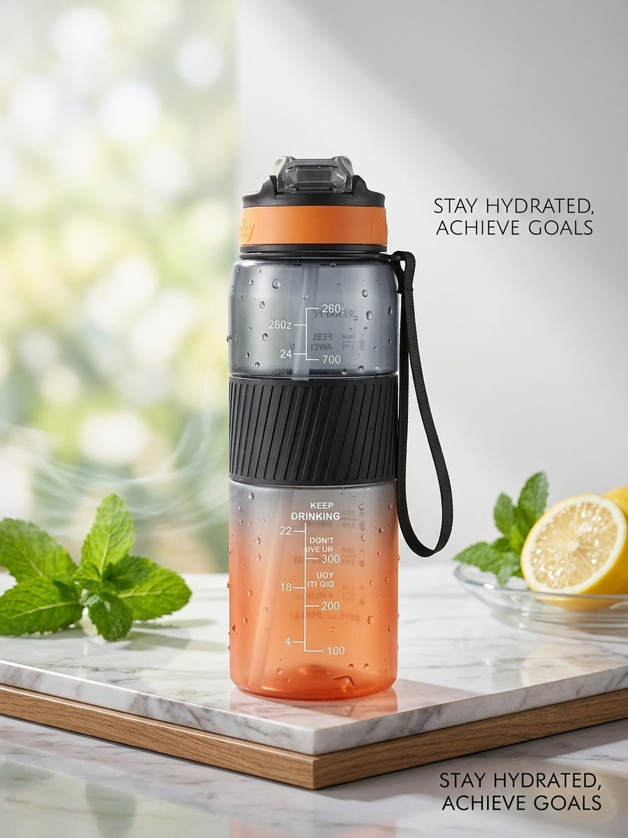 Sports water bottle with straw, orange-to-charcoal gradient bottle with carry handle.